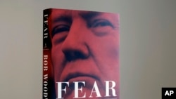 A copy of Bob Woodward's "Fear" is photographed Wednesday, Sept. 5, 2018, in New York. It's not clear whether President Donald Trump has much to fear from "Fear" itself. 