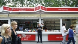 A book fair in Madrid. More Spaniards are learning English these days.