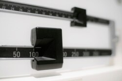 This Tuesday, April 3, 2018 photo shows a closeup of a beam scale in New York.