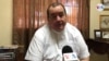 Monseñor Carlos Avilés, vocero de la Curia Arzobispal explica que las acciones pretenden prevenir la propagación del coronavirus. [Foto: Daliana Ocaña, VOA].