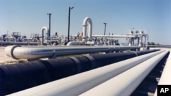 Los precios del petróleo permiten un aceleramiento de la economía a través del gasto del consumidor