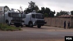 Police blocking the main entrance at Barbourfields Stadium in Bulawayo.