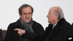 Platini et Blatter le 16 décembre 2014. (AP Photo/Christophe Ena)