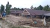 Kondisi rumah-rumah penduduk yang tertimbun lumpur di desa Radda, Kecamatan Baebunta, Luwu Utara, Sulawesi Selatan (16/7). (Foto: Zwaib Leibe/SAR Mapala Muhammadiyah Indonesia)