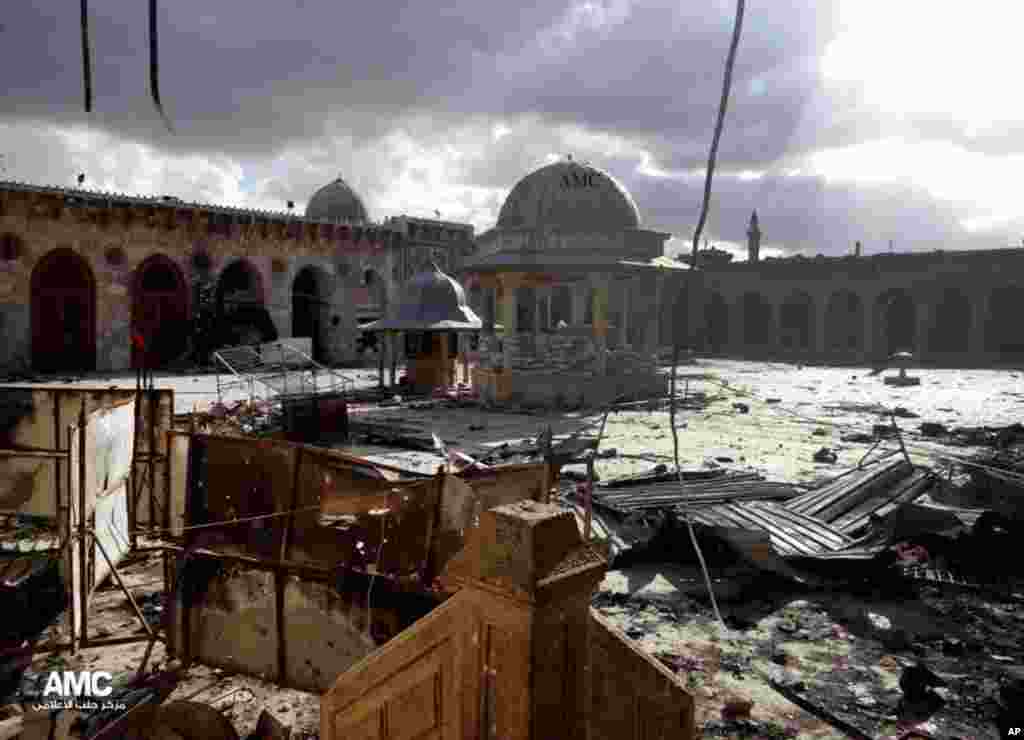 This citizen journalism image provided by Aleppo Media Center shows the famed 12th century Umayyad mosque in Aleppo, which was damaged by shelling, May 13, 2013.