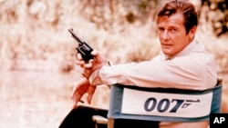 FILE - British actor Roger Moore, playing the title role of secret service agent 007, James Bond, is shown on location in England in 1972. Moore, played Bond in seven films, more than any other actor. Roger Moore's family said Tuesday May 23, 2017 that t