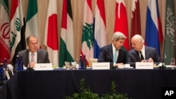 U.S. Secretary of State John Kerry, center, sits with U.N. Special Envoy to Syria, Staffan de Mistura, right, and Russian Foreign Minister Sergei Lavrov during a meeting of the International Syria Support Group in New York, Sept. 20, 2016.