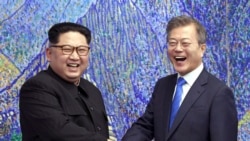FILE - North Korean leader Kim Jong Un, left, and South Korean President Moon Jae-in inside the Peace House at the border village of Panmunjom in Demilitarized Zone, South Korea, April 27, 2018.