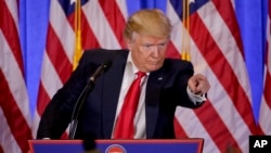 President-elect Donald Trump takes questions during a news conference, Jan. 11, 2017, in New York. The news conference was his first as President-elect.