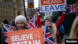 Pro-Brexit protesters demonstrate outside the Houses of Parliament, ahead of a vote on Prime Minister Theresa May's Brexit deal, in London, Britain, Jan. 15, 2019.