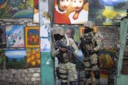Soldiers patrol in Petion Ville, the neighborhood where the late Haitian President Jovenel Moise lived in Port-au-Prince, Haiti, Wednesday, July 7, 2021.