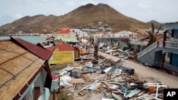 Buildings that were partially or completely destroyed by Irma are seen during the visit of France's President Emmanuel Macron in the French Caribbean islands of St. Martin, Sept. 12, 2017.