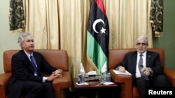 Libya's Prime Minister Mustafa Abu Shagour (R) meets visiting U.S. Deputy Secretary of State William Burns in Tripoli, Libya, September 20, 2012.