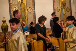 Members of the Arab-American community worship at St. Mary's Antiochian Orthodox Church in the Brooklyn borough of New York, Oct. 9, 2016.