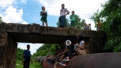 Tourists take part in a historic walking tour on 85-year-old Myanmar pipeline amid the spread of the coronavirus disease (COVID-19) in Yangon, Myanmar, June 20, 2020. Picture taken June 20, 2020. REUTERS/Zaw Naing Oo NO RESALES NO ARCHIVES