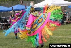This photo shows Fancy Shawl dancers performing at a pow wow in San Jose, Cal., date unknown.
