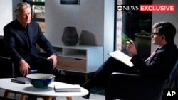 This image released by ABC News shows actor-producer Alec Baldwin, left, during an interview with “Good Morning America” co-anchor George Stephanopoulos. The hourlong interview about the fatal shooting on the set of Baldwin's film “Rust,” will air Dec. 2.