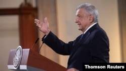 Mexico's President Andres Manuel Lopez Obrador speaks during a news conference before traveling to Washington D.C. to meet with U.S. President Donald Trump, at the National Palace in Mexico City, July 8, 2020. 