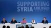 United Nations Secretary-General Ban Ki-moon, Norway's Prime Minister Erna Solberg, German Chancellor Angela Merkel, and the Emir of Kuwait, Sheikh Sabah al-Ahmad al-Sabah (L-R) listen as Britain's Prime Minister David Cameron speaks at the donors Confere