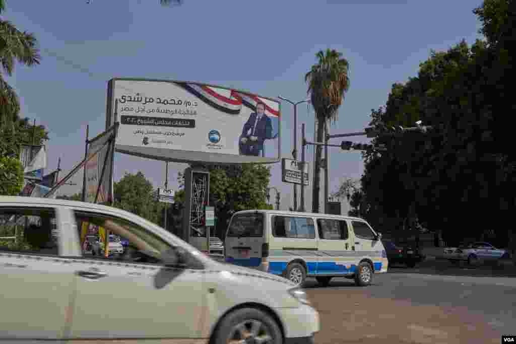 Turnout appeared to be low on the first day of the two-day vote, and photographers were banned from many polling stations in Cairo, Aug. 11, 2020.
