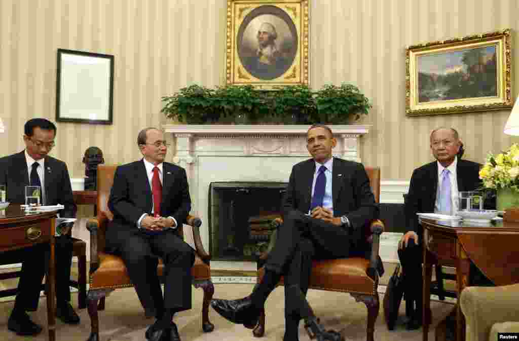 President Barack Obama sits with Burma's President Thein Sein in the Oval Office at the White House, Washington, May 20, 2013.