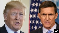 Presiden AS Donald Trump hari Rabu (15/2) membela penasihat keamanan nasional yang sudah dipecatnya – Michael Flynn (kanan).