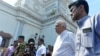 FILE - Sri Lankan Prime Minister Ranil Wickremasinghe (2nd R) arrives to visit the site of a bomb attack at St. Anthony's Shrine in Kochchikade in Colombo, April 21, 2019. 