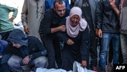 بازماندگان برخی قربانیان حملات ۱۷ نومبر اسراییل بر ساحه بیت لاهیا در غزه