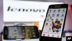 New Lenovo Vibe X smartphones displayed at IFA, one of the world's largest trade fairs for electronics and electrical appliances, Berlin, Sept. 5, 2013.