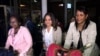 FILE - Cuban doctors arrive at the Jomo Kenyatta International Airport amid controversy surrounding their pay in Nairobi, Kenya, June 5, 2018. 