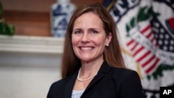 Judge Amy Coney Barrett, President Donald Trumps nominee for the US Supreme Court, meets with Sen. Cindy Hyde-Smith, R-Miss., on Capitol Hill in Washington, Sept. 30, 2020. 