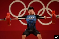 Cabang angkat berat mewakili seperempat dari kasus positif doping olimpiade.