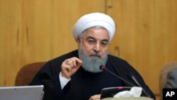លោក​ប្រធានាធិបតី​អ៊ីរ៉ង់ Hassan Rouhani ថ្លែង​នៅ​ក្នុង​កិច្ចប្រជុំ​ក្នុង​ក្រុង​តេហេរ៉ង់ កាលពី​ថ្ងៃទី៣១ ខែធ្នូ ឆ្នាំ២០១៧។
