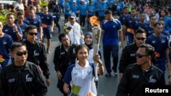 Atlet para games, Nanda Mei Sholiah, saat mengikuti kirab obor Asian Games 2018, menjelang pelaksanaan Asian Games pada 18 Agustus-2 September lalu, Yogyakarta, 19 Juli 2018. Setelah Asian Games usai, kompetisi olahraga untuk atlet difabel, Asian Para Games 2018, akan digelar di Jakarta pada Oktober.