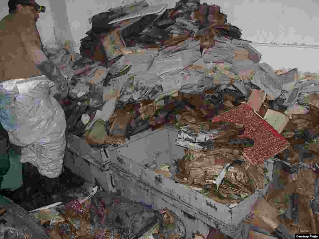 Materials are piled up before treatment and restoration. (U.S. National Archives)