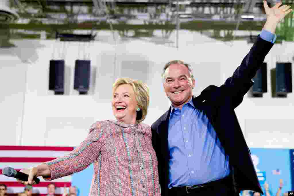 Democratic presidential candidate Hillary Clinton and Sen. Tim Kaine, participate in a rally at Northern Virginia Community College in Annandale, Virginia, July 14, 2016. Clinton has chosen Kaine to be her running mate in the 2016 presidential election.