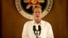 Philippine President Benigno Aquino III addresses the nation in a live broadcast from the Presidential Palace in Manila, July 14, 2014. 