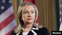 U.S. State Secretary Hillary Clinton listens during a news conference in Riga, Latvia June 28, 2012. 