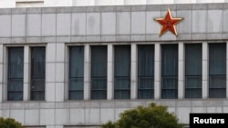 FILE - Part of the building of 'Unit 61398', a secretive Chinese military unit, is seen in the outskirts of Shanghai.