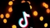 This photo taken on Nov. 21, 2019, shows the logo of the social media video sharing app Tiktok displayed on a tablet screen in Paris. 
