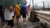 Rains, Wind From Typhoon Nida Shut Down Hong Kong
