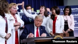U.S. President Donald Trump hosts an executive order signing ceremony at the White House in Washington, July 24, 2020.