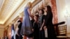 Ivanka Trump shakes hands with people honored for their work to stop human trafficking including Allison Lee, of Taiwan, and Boom Mosby, of Thailand, right, during a 2017 Trafficking in Persons Report ceremony at the State Department, June 27, 2017, in Washington.