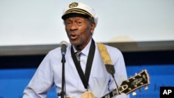 FILE - Rock 'n' roll legend Chuck Berry performs "Johnny B. Goode" at the John F. Kennedy Presidential Library and Museum in Boston, Feb. 26, 2012. 