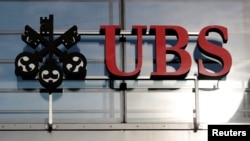 FILE - The logo of Swiss bank UBS is seen in Zurich, Oct. 25, 2018. 