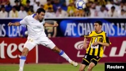 Un match de football en cours au stade de Jeddah, 14 avril 2010.