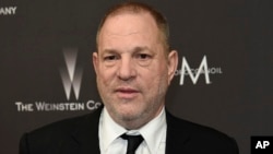 FILE - Harvey Weinstein arrives at The Weinstein Company and Netflix Golden Globes afterparty in Beverly Hills, California, Jan. 8, 2017.