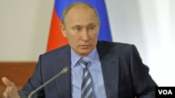 PM Rusia Vladimir Putin menghadiri pertemuan Front Populer Rusia, yang menjadi wadah para pendukungnya di Moskow (27/12).