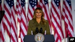 First lady Melania Trump speaks on the second day of the Republican National Convention from the Rose Garden of the White House, Tuesday, Aug. 25, 2020, in Washington. (AP Photo/Evan Vucci)