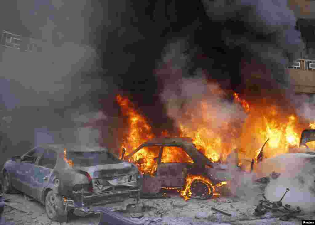 Cars burn following an explosion in the Haret Hreik area in the southern suburbs of the Lebanese capital Beirut. A suicide bomber killed four people in a residential neighborhood of southern Beirut known for its support of Shi'ite military and political group Hezbollah, security sources said.
